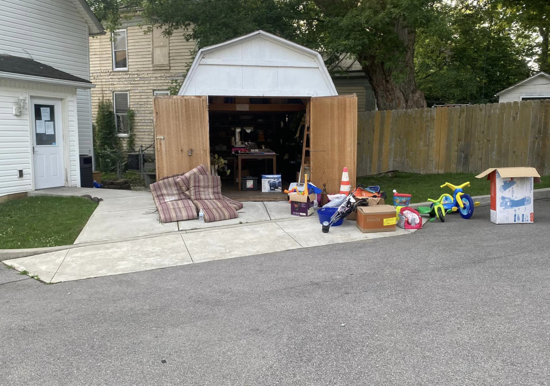 donation shed with items out front