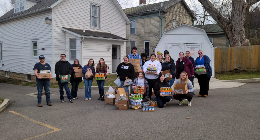 donation house with people in front